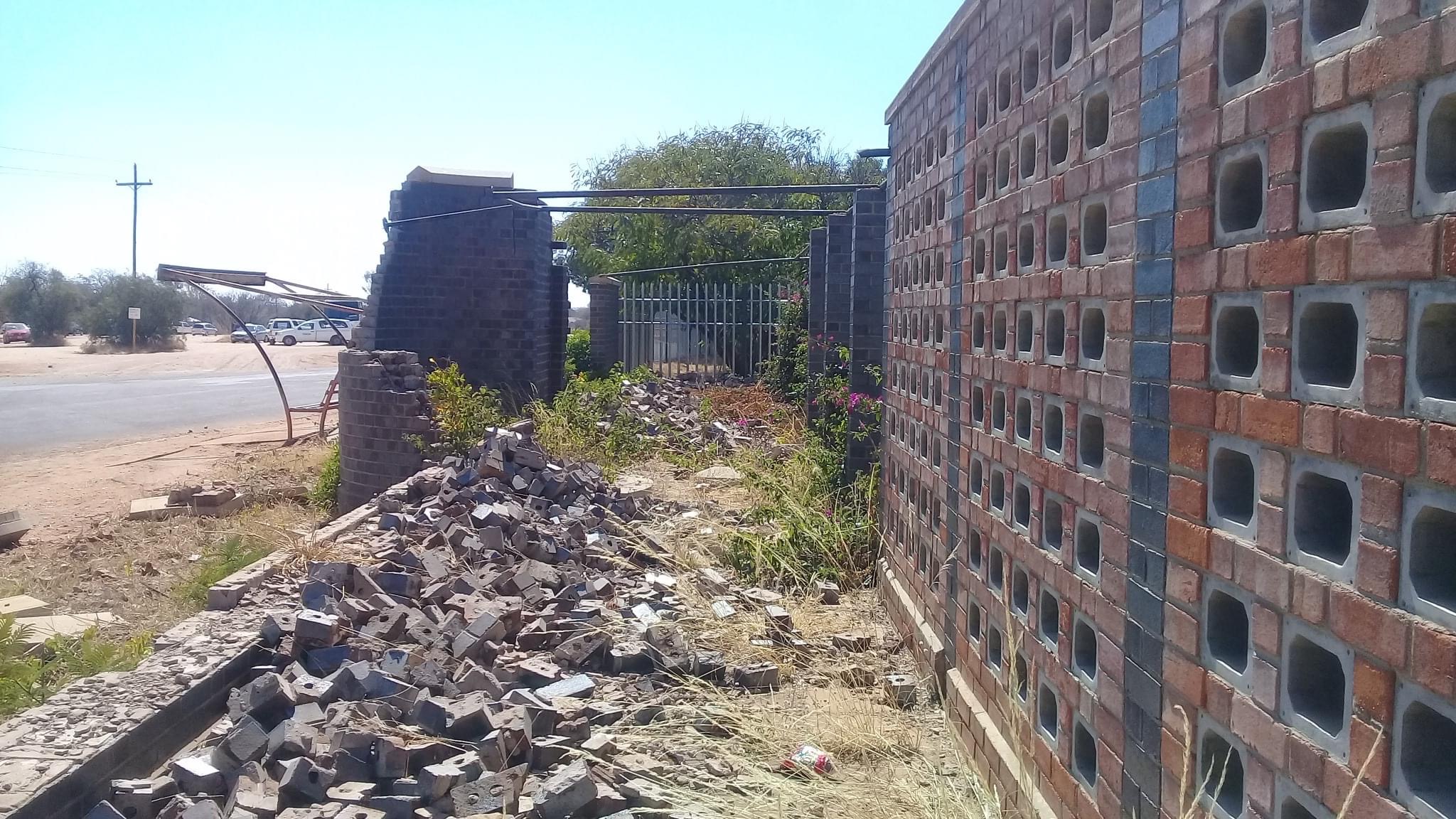 cemetery_wall_of_rememberance_debris