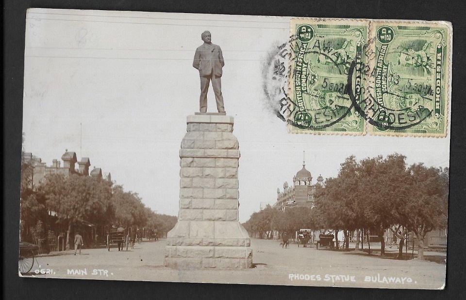 ed_pc_sapsco_bseries_1920s_rhodes_statue_main_street.JPG