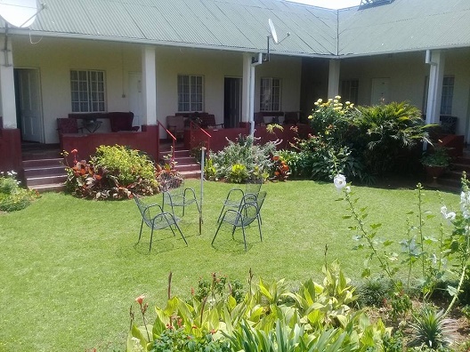 at_oah_qm_ret_queen_mary_house_chairs_verandah.JPG